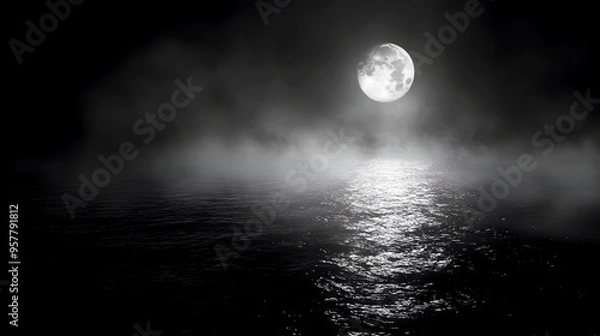 Fototapeta dark, reflective sea surface under the soft light of a full moon