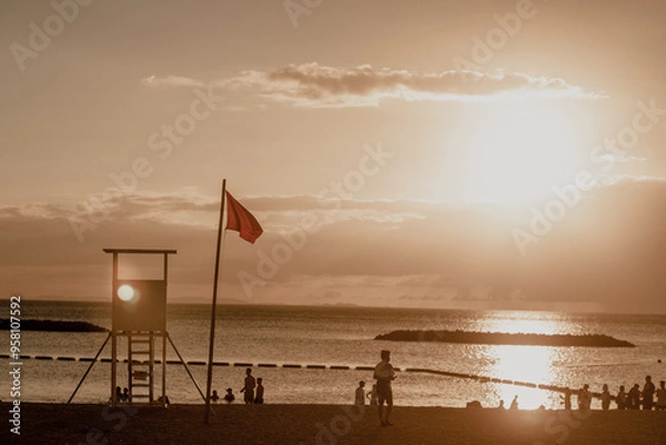 Obraz lifeguard tower at sunset