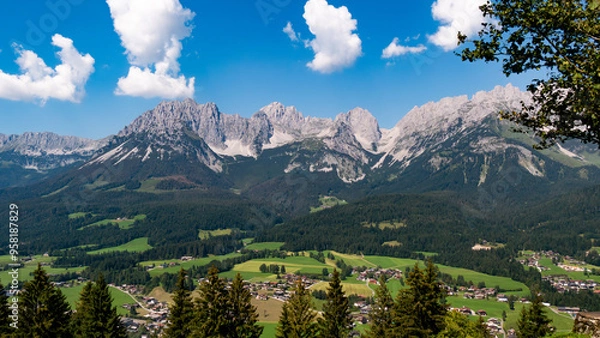 Obraz Idyllisches Bergpanorama mit blauem Himmel und Blick auf den Wilden Kaiser