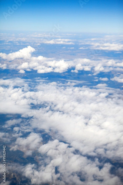 Fototapeta sky and Clouds looking from the Airplane