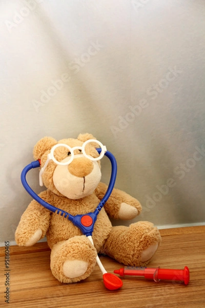 Fototapeta Flauschiger Teddybär mit Stethoskop