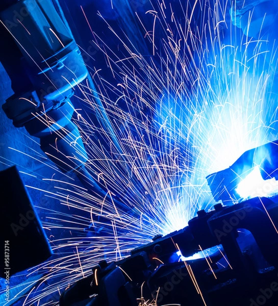 Obraz  Robot welding movement Industrial automotive part in factory