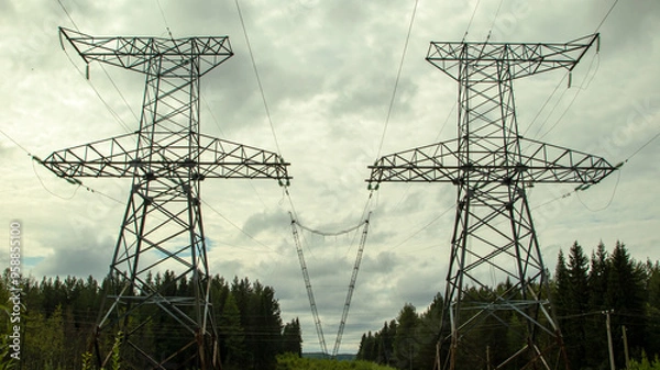 Fototapeta high voltage power lines against a gloomy sky