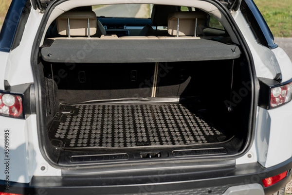 Fototapeta Empty trunk of a suv car