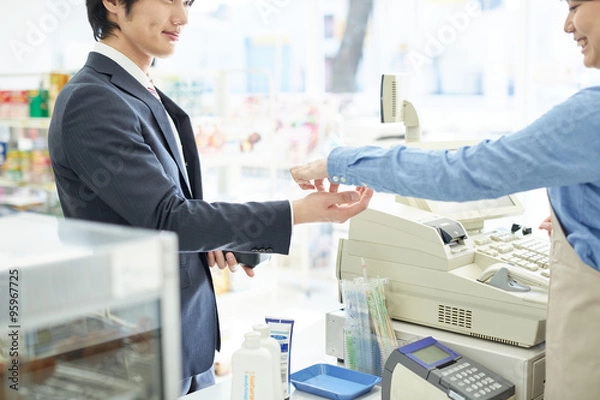 Obraz レジの客と店員