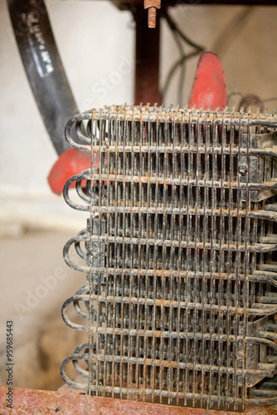 Obraz freezer condenser coil, heavily coated in dust and debris