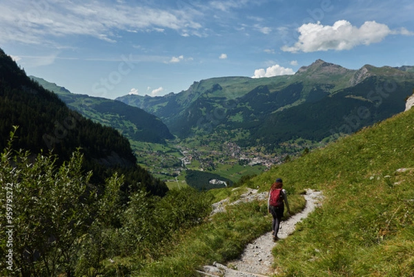Obraz Hiking to the Gletscherschlucht glacier in Grindelwald, with imposing canyons, waterfalls and panoramic views of the valley. Swiss Alps