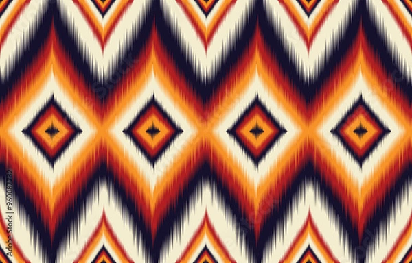 Fototapeta Geometric pattern with vibrant orange and red hues. Inspired by Native American textiles. Seamless design for fabric or wallpaper. Bold and striking pattern for modern decor. Warm ethnic pattern.
