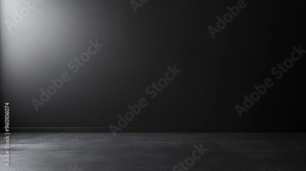Obraz A black room with a wall that is covered in a textured surface