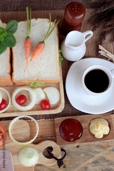 Fototapeta Slice bread ,ham ,fried eggs with breakfast.