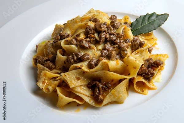 Obraz Plate with pappardelle with wild boar ragout sauce with bay leaf