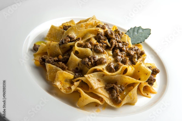 Fototapeta Plate with pappardelle with wild boar ragout sauce with bay leaf