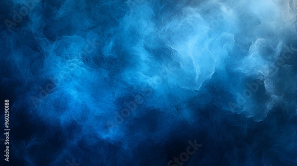 Fototapeta Abstract blue smoke swirling gracefully in dark space creates an ethereal atmosphere and captivating visual depth