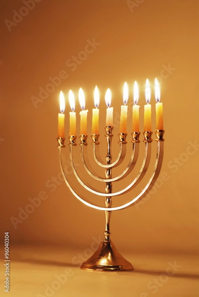 Obraz Brightly Lit Hanukkah Menorah on a Warm Gold Background