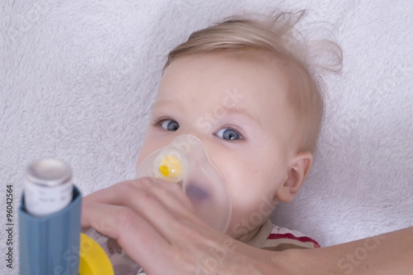 Fototapeta Infant with asthma inhalator