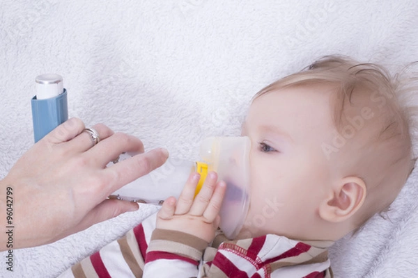 Fototapeta Infant with asthma inhalator