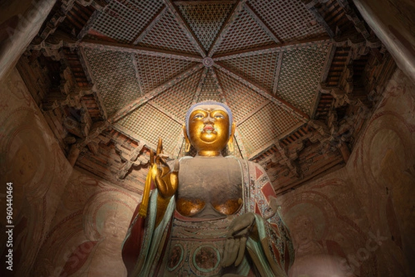 Fototapeta A large seated Buddha statue on the first floor of the wooden pagoda in Ying County, Shanxi Province, China