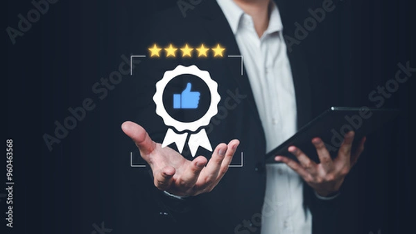 Fototapeta Businessman hand hold and show best quality guarantee with five golden stars and Like icon for product guarantee and service