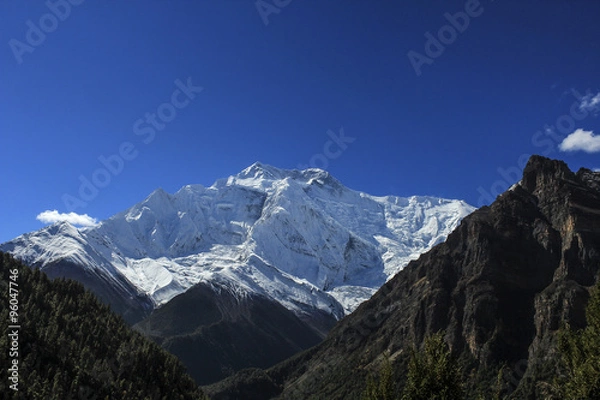 Fototapeta Sunrise in Upper Pisang, view of the Annapurna Range