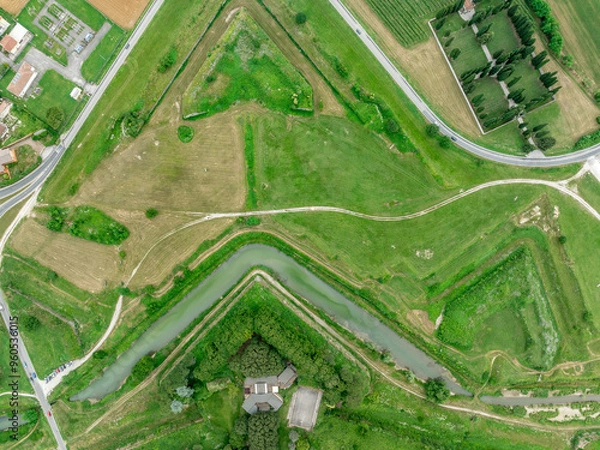 Fototapeta Aerial view of fort military architecture: ravelin with glacis, traverses, place of arms, counterguard, redoubt at Palmanova fortress Italy