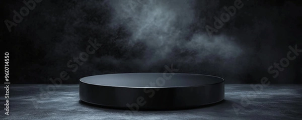 Fototapeta A round, black podium with a glossy finish, placed in front of a dark, dramatic background with subtle lighting to highlight the podiumâ€™s edges.