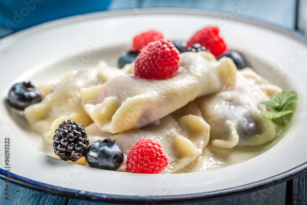 Fototapeta Sweet dumplings with fresh fruits