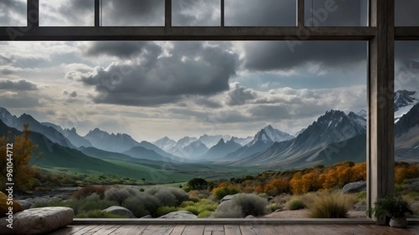 Fototapeta This image shows a modern, minimalist interior with a panoramic view of a stunning mountain range.