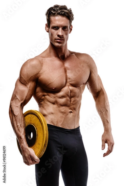 Obraz Muscular bodybuilder guy doing exercises with dumbbells