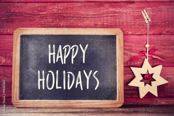 Obraz christmas star and text happy holidays in a chalkboard