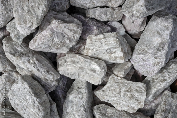 Fototapeta Hard rock spodumene ore, commercially important source of lithium. Mine, mining, background, copy space.