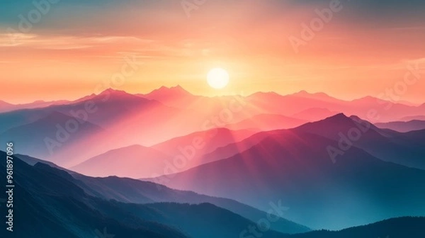 Obraz A breathtaking view of mountains at sunset, with vibrant colors and soft light creating a serene and tranquil atmosphere.