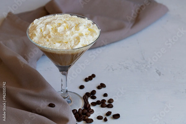 Obraz chocolate mousse with whipped cream. coffee cocktail in martini glass with whipped cream on dark background. Alcoholic or non-alcoholic cocktail with liqueur, whiskey, white cream. copy space.