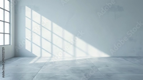 Obraz A large, empty room with a window that lets in sunlight