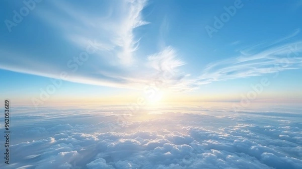 Fototapeta The sky is blue with a few clouds scattered throughout