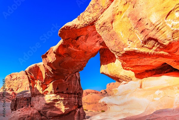Fototapeta Wadi Rum Desert, Jordan.: Um Fruth bridge, a rocky formation in the red desert Valley of the moon. Central Asia travel destination