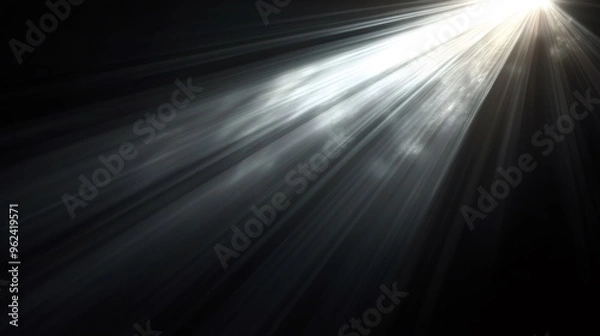Fototapeta Abstract light rays in a black background, with a diagonal white light ray.