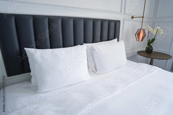 Obraz Bedroom with white bed with pillows