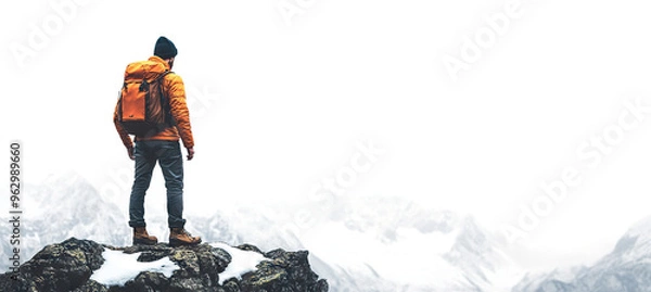 Fototapeta Mountain climber with backpack viewing snow-covered peaks, cut out