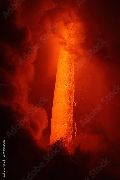 Fototapeta Lava tube flowing into ocean in Hawaii shows the violent explosions that happen when lava hits seawater.