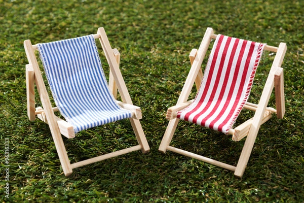 Obraz Two Model Deckchairs On Grass