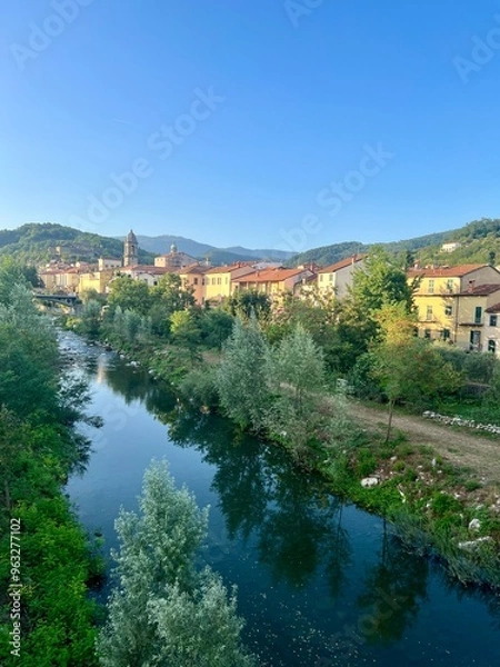Obraz Pontremoli with view of the rooftops and the Magra River, with the bell tower and the church dome in the background.