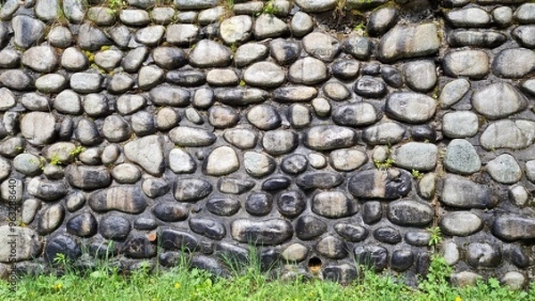 Obraz Stone wall built from natural stone washed by rain