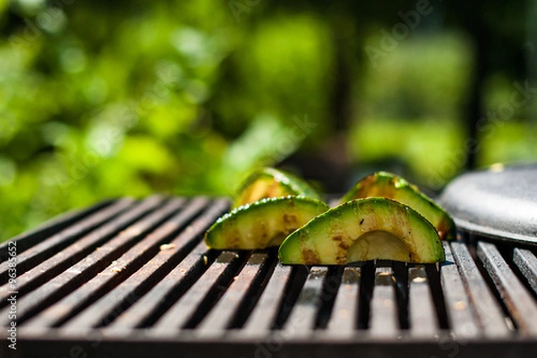 Obraz Avocado quarters prepared on the grill