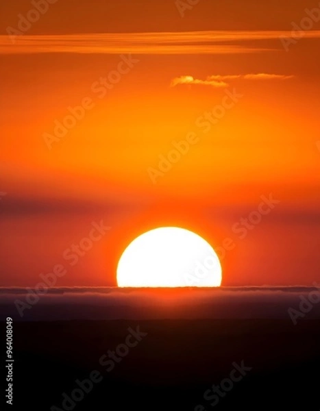 Fototapeta An icon of the sun partially rising over a horizon, symbolizing morning or dawn
