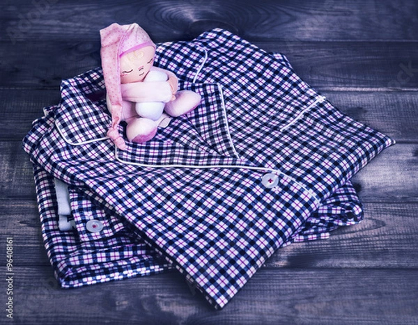 Fototapeta On a wooden table checkered