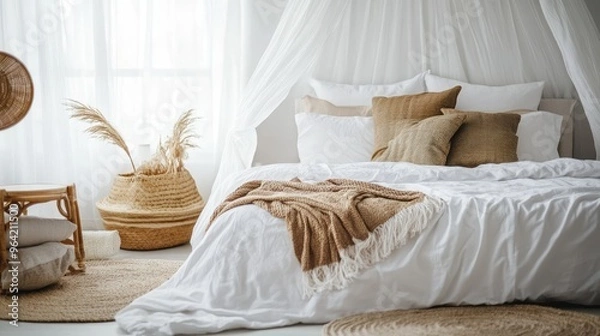 Fototapeta Hotel room with comfortable double bed  neatly white sheets  decorative cover and pillows. Bedroom with textile decor  cushions and bedding. Concepts of cozy morning at home