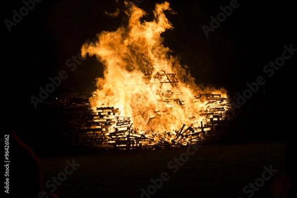 Obraz Roaring Bonfire with crates