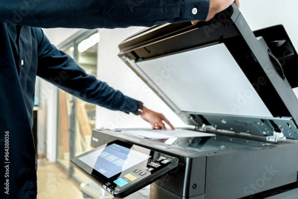 Fototapeta Hand use copier or photocopier or photocopy machine office equipment workplace for scanner or scanning document or printer for printing paperwork hard copy duplicate Xerox service maintenance repair.