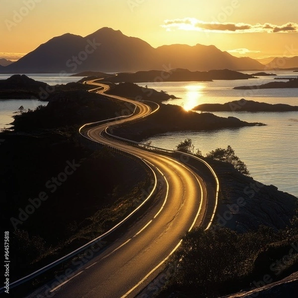 Fototapeta The Atlantic Ocean Road at sunrise, with the first light of day casting long shadows on the road.