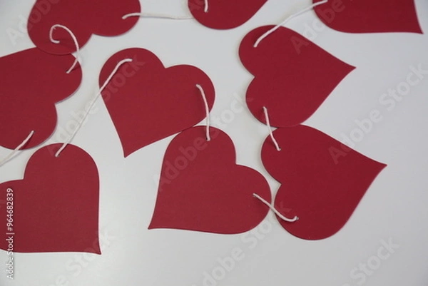 Obraz Red paper hearts garland is romantic decoration for Saint Valentine day.